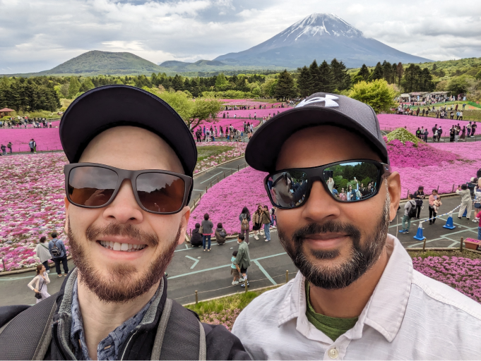 Me and my partner posing at a Spring festival in Japan, with Mt. Fuji in the background